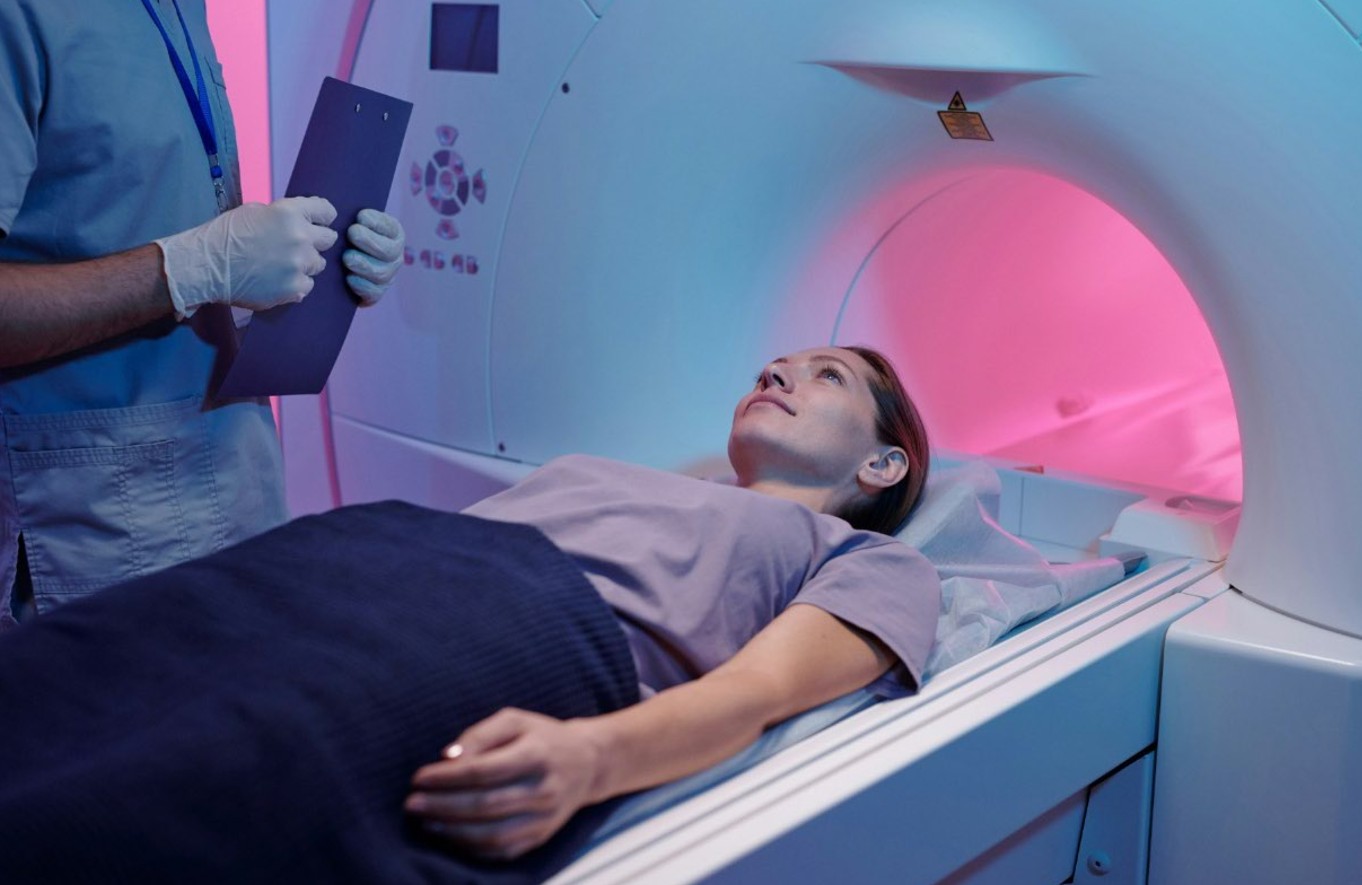 A staff member with Dr. Susan Baker MD evaluating advanced diagnostic imaging from a radiation-free Prenuvo Whole Body Scan at her Beverly Hills office.