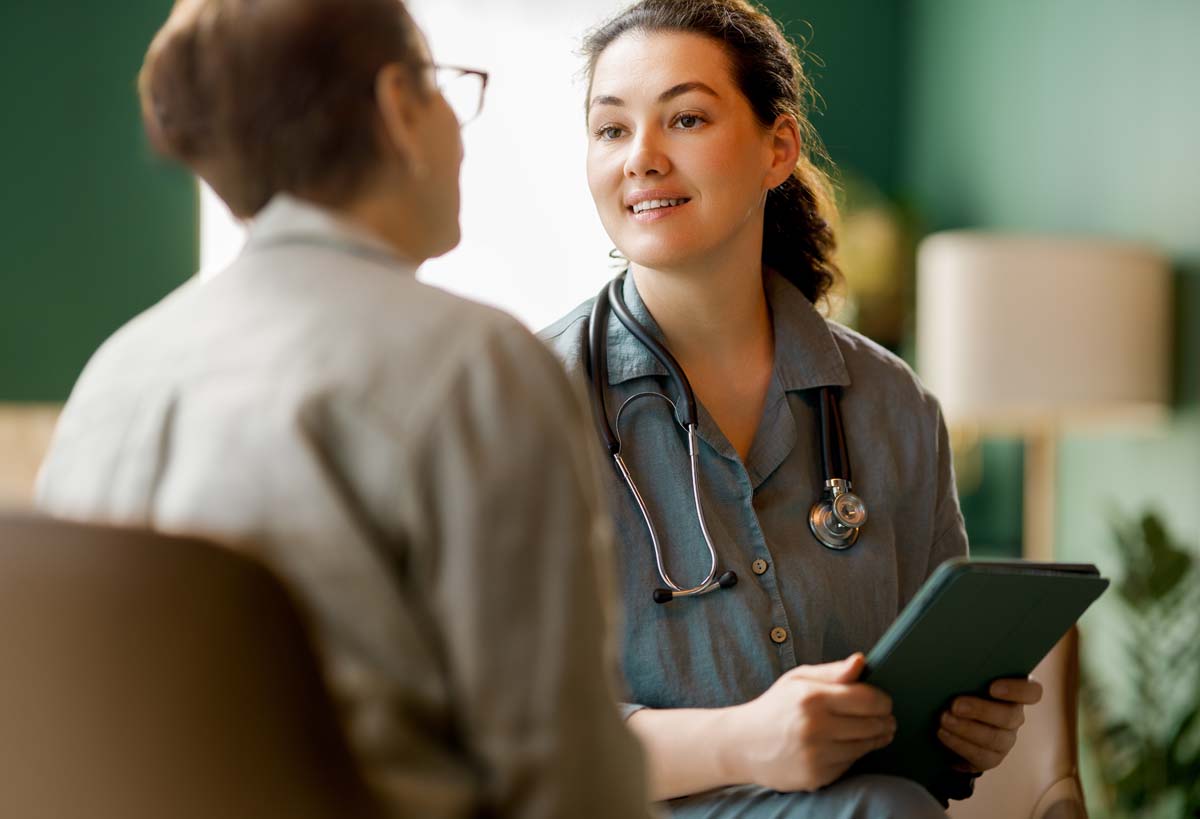 The team at Dr. Susan Baker MD evaluating clinical diagnostic reports to treat inflammatory bowel arthritis at her Beverly Hills medical practice.