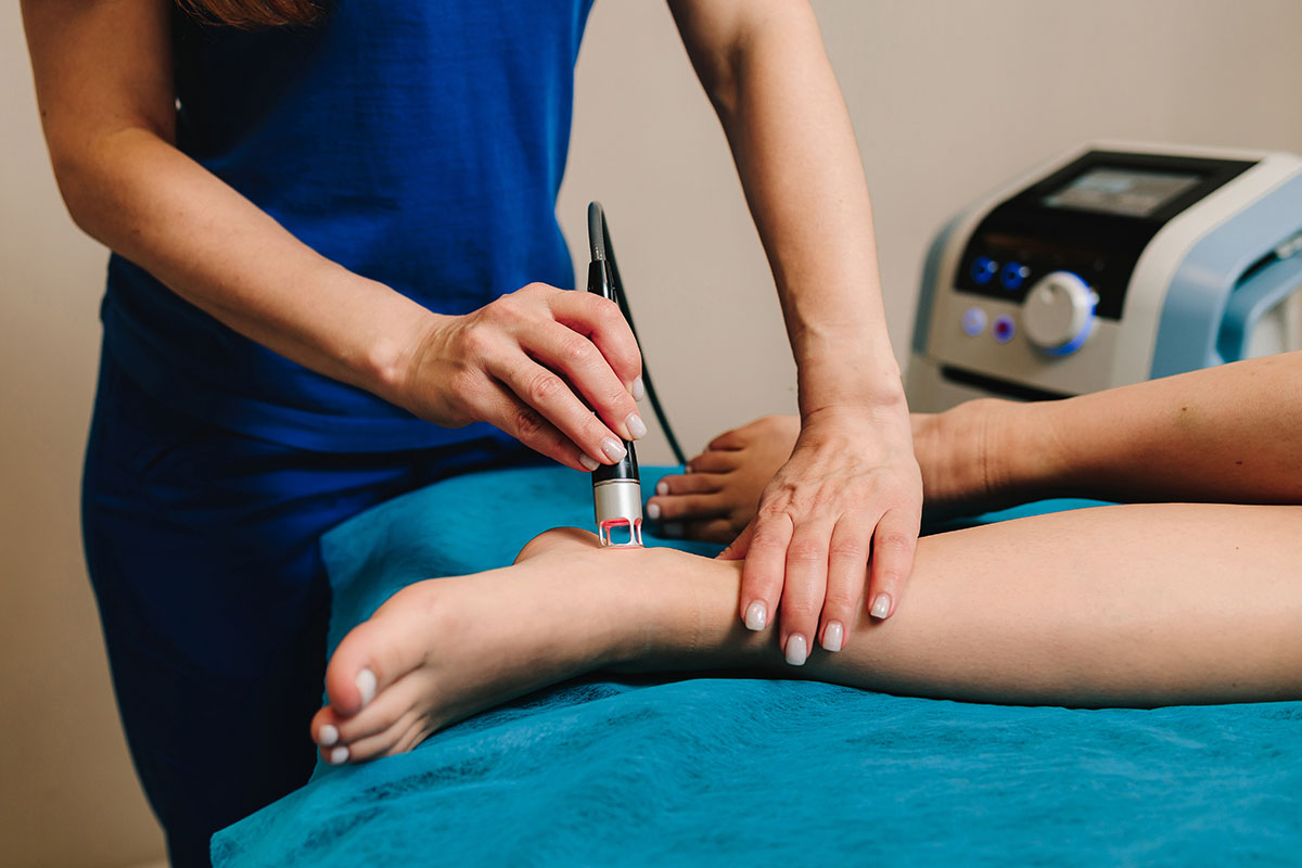 Dr. Susan Baker MD administering a gentle Aerolase laser therapy treatment in her Beverly Hills medical practice.
