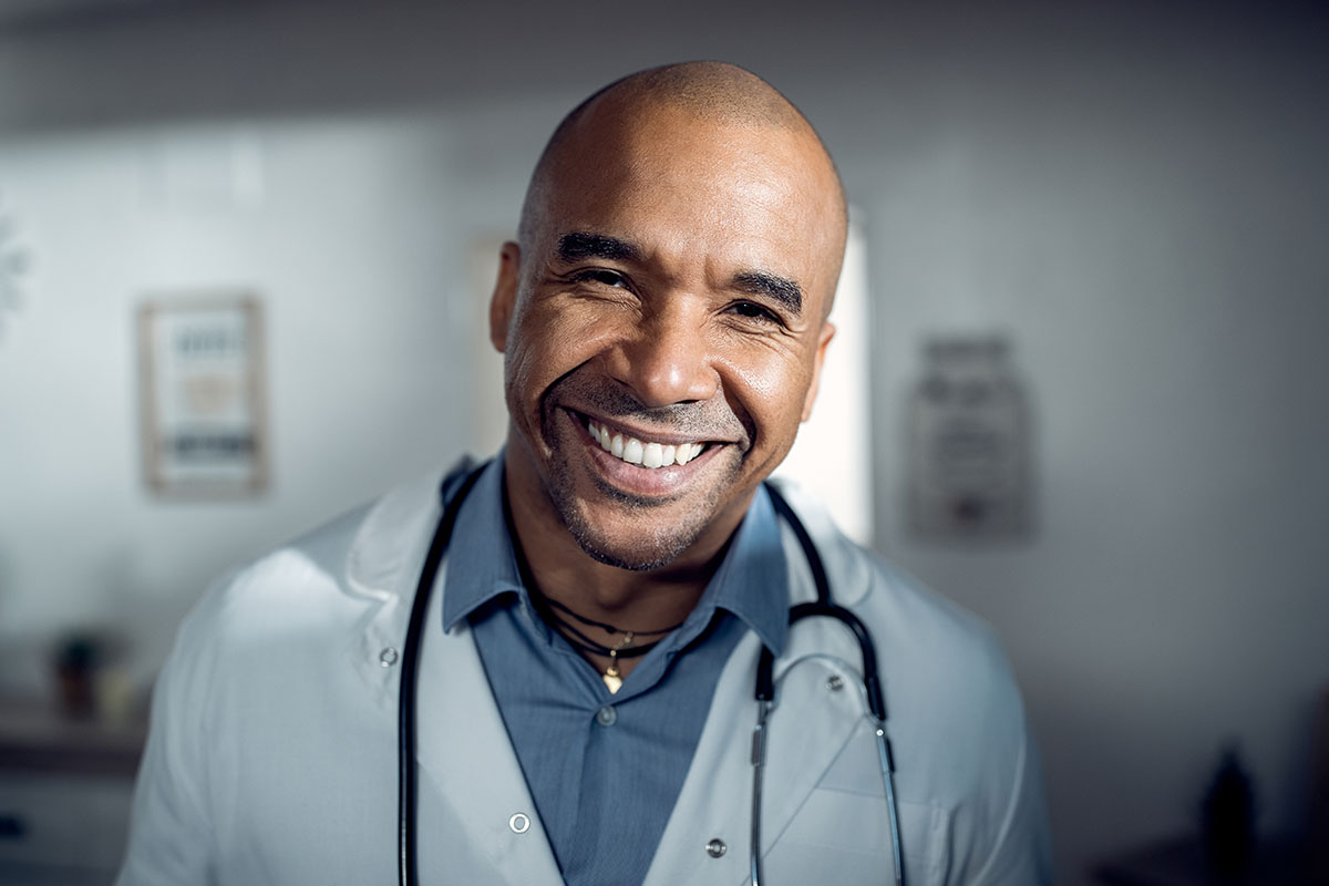 Happy doctor at Dr. Susan Baker MD greets patients to the office in Beverly Hills