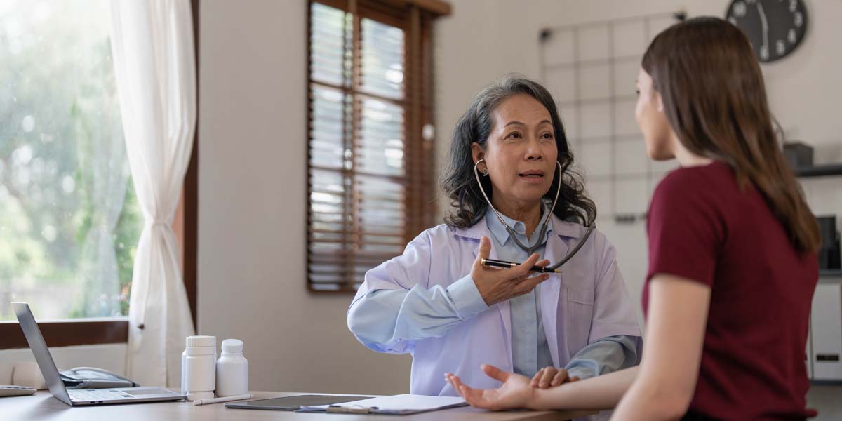 Team member of Dr. Susan Baker MD evaluating advanced autoimmune diagnostics to treat vasculitis at her Beverly Hills patient's home.