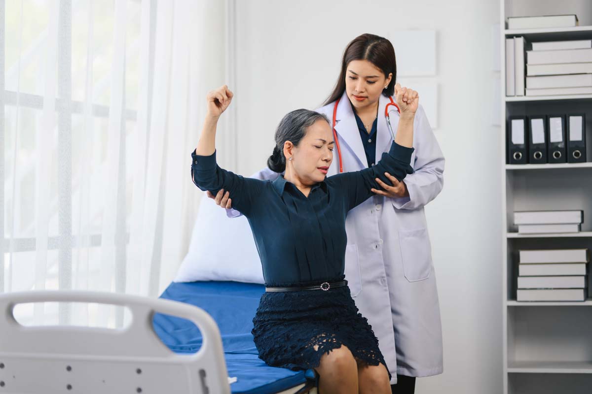 Dr. Susan Baker MD team member discussing an advanced autoimmune care plan for lupus at her Beverly Hills medical practice.
